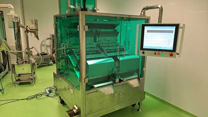 膠囊片劑檢重秤現(xiàn)場(chǎng)工作.jpg 膠囊片劑檢重秤現(xiàn)場(chǎng)工作.jpg